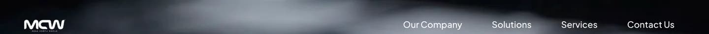 The website header: the white MCW logo beside Our Company, Solutions, Services and Contact Us